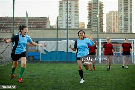 Female Footballers Celebrating Goal Photos and Premium High Res ...