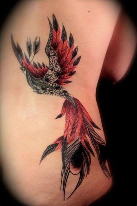 phoenix tattoo on rib | Neck tattoo, Tattoos, Classy tattoos for women