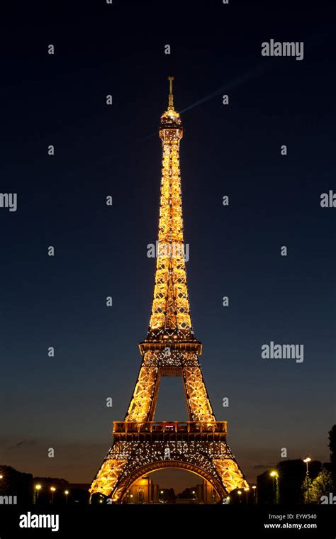 Eiffel Tower light show and spotlight Stock Photo - Alamy