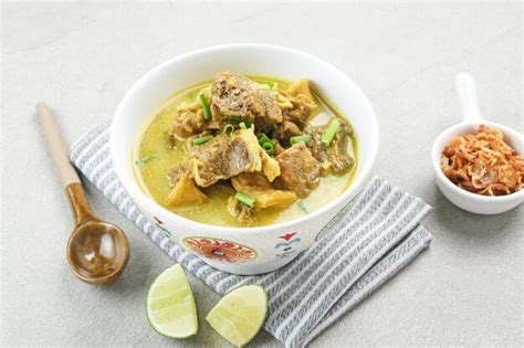 Premium Photo | Empal gentong cirebon traditional beef soup with ...