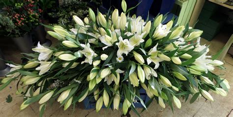 White lily full casket spray | Funeral flowers, Casket flowers, Casket ...