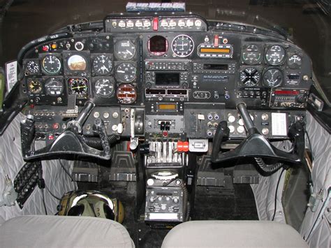 the cockpit of an airplane with multiple instruments