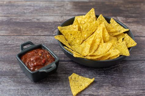 Nachos Corn Chips with Fresh Homemade Salsa on Wooden Table Stock Photo ...