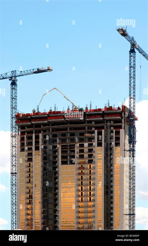 Cranes at a construction site Stock Photo - Alamy