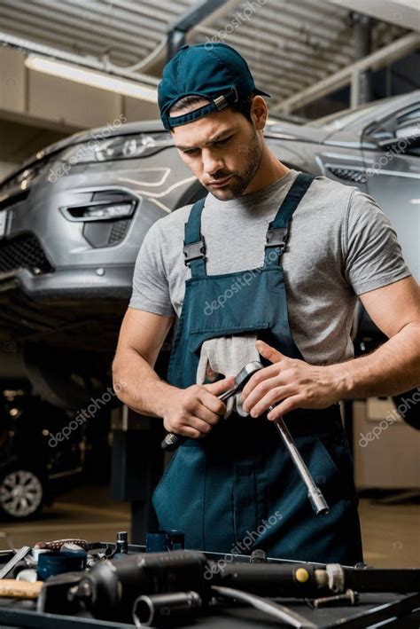 Portrait Auto Mechanic Uniform Lug Wrench Auto Repair Shop Stock ...