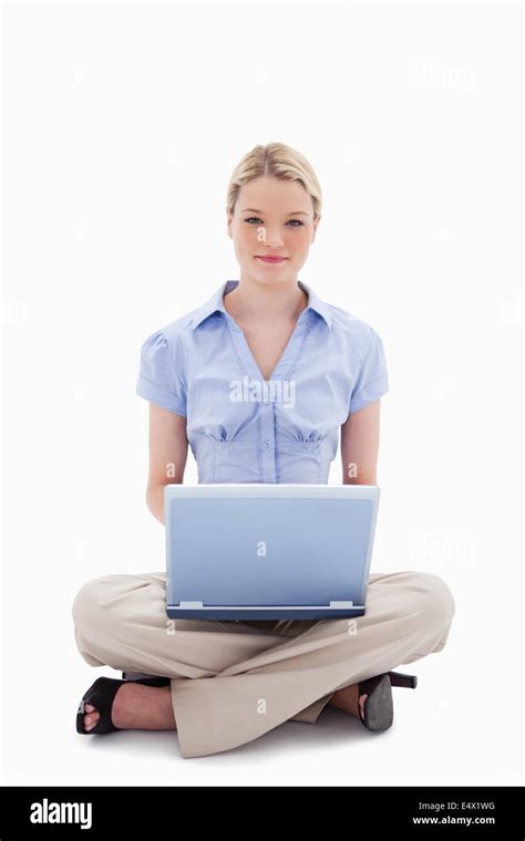 Woman sitting with her laptop Stock Photo - Alamy