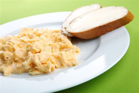 Scrambled Eggs and Bread with Butter Stock Photo - Image of butter ...