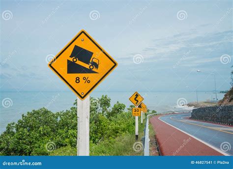 Warning Steep Road Sign Slope And Truck On Hill. Royalty-Free Stock ...