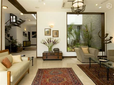 Living Room with rugs designed by Kumar Moorthy Associates House Living ...