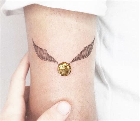 Golden snitch tattoo by Kozo Tattoo | Photo 30593