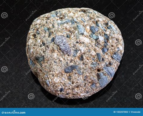 Pebble of Arkose Sandstone on Dark Background Stock Photo - Image of ...