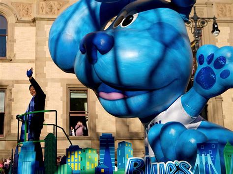 Photos: High-flying balloon characters star in Thanksgiving parade ...