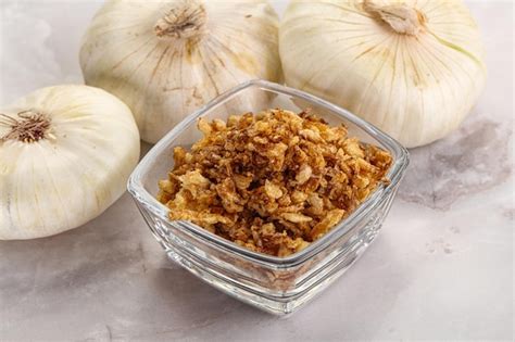 Premium Photo | Dried roasted onion crunchy flakes for culinary