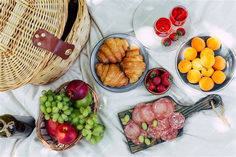 Premium Photo | Picnic in the park on the green grass