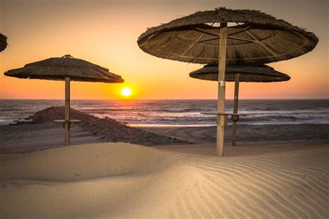 Costa Nova beach in Aveiro, Portugal. | Beautiful beaches, Patio ...