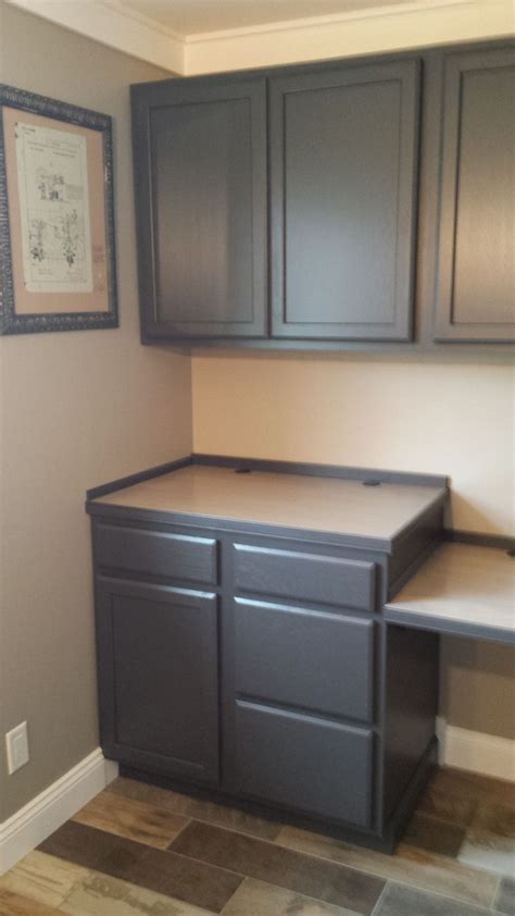 Finished cabinets painted in Behr Cracked Pepper | Grey kitchen designs ...