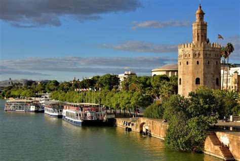 Torre del Oro along Guadalquivir River in Seville, Spain - Encircle Photos