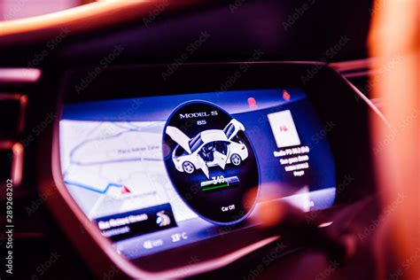 PARIS, FRANCE - NOV 29, 2014: POV New Tesla Model S dashboard computer ...