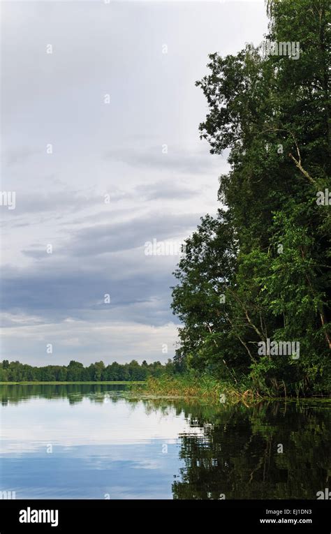 Lake landscape. Cloudy day Stock Photo - Alamy