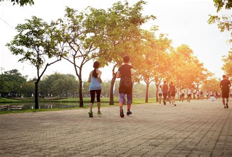 Group of People Jogging in the Park Editorial Photography - Image of ...