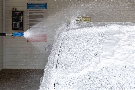 Closeup With Selective Focus Of Applying Soap Suds In An Indoor Car ...