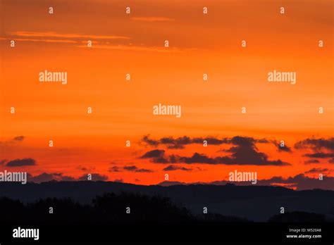 Red Dawn Sky with Copy Space Stock Photo - Alamy