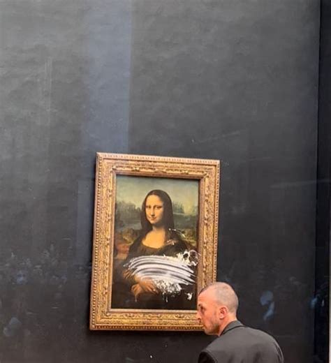 Mona Lisa Attacked in Louvre With Cake By Man Wearing Wig