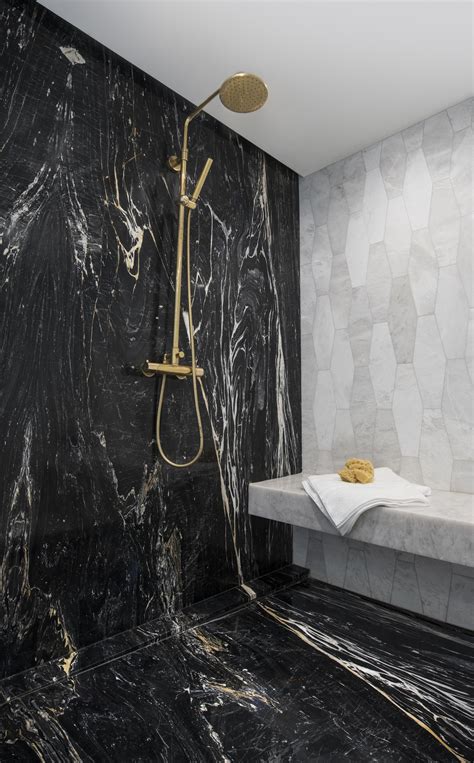 Zebrino Black marble shower with gold plumbing. | Black marble bathroom ...