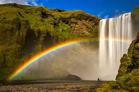 Skogafoss Waterfall and Rainbow - Iceland Photograph by Stuart Litoff ...