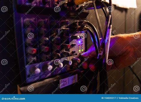 Sound Engineer Using Equipment at Work. Stock Image - Image of level ...