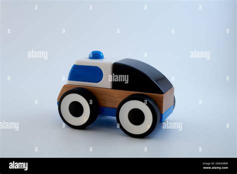 Wooden toy ambulance car. Isolated on white background Stock Photo - Alamy