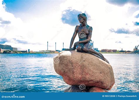 The Little Mermaid Statue By The Waterside At The Langelinie Promenade ...