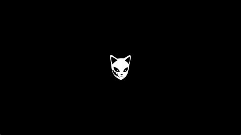 a black background with an image of a cat's head