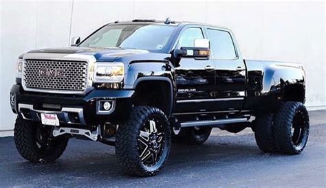 Lifted GMC Dually Woah this thing is awesome! Not my wheel choice but ...