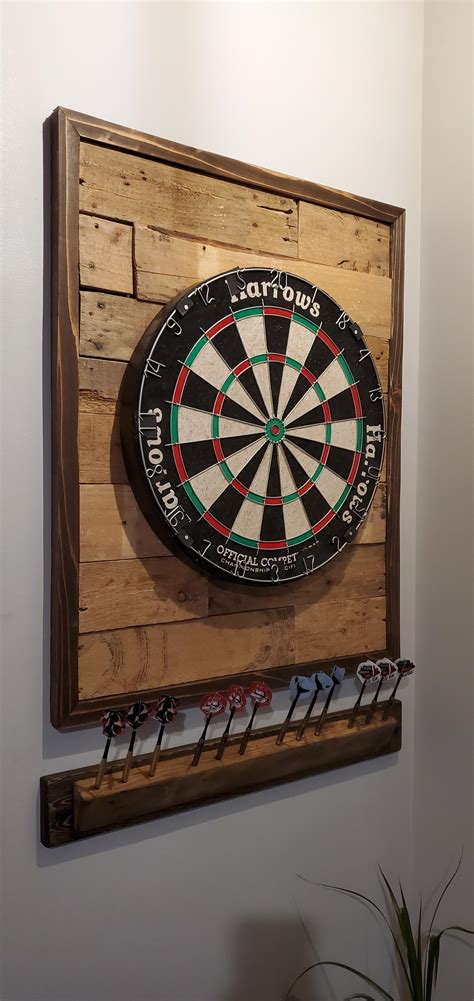 Custom Dartboard backing and dart holder I made. Just used Cedar and ...