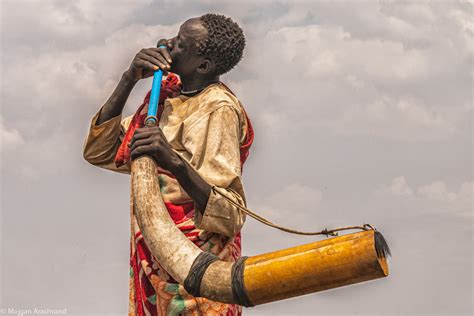 Mojgan-Arashvand-TUng-wind-instrument-young-Mundari-man-celebrations ...