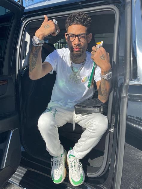 PnB Rock Wearing a White and Green Amiri, & Louis Vuitton Outfit ...