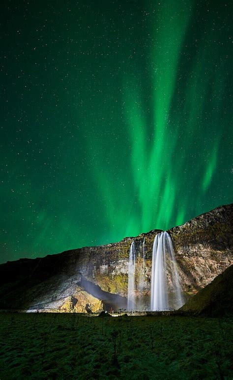 Seljalandsfoss Waterfall and Aurora … – License image – 71398559 Image ...