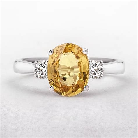 Oval Cut Yellow Sapphire & Diamond Ring