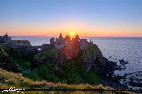 Sunset Between Dunluce Castle Northern Ireland | Royal Stock Photo