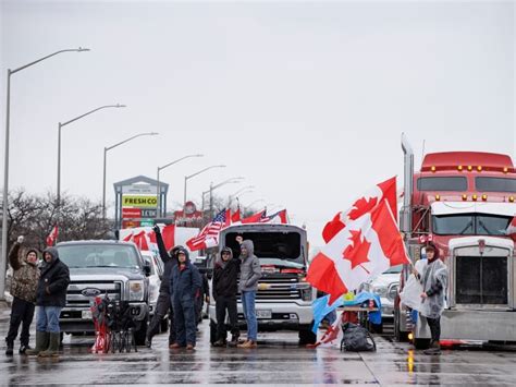 Scenes of truck convoy protests blocking Canada-U.S. border crossings ...