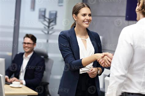 Business people shaking hands in the office 15764928 Stock Photo at ...