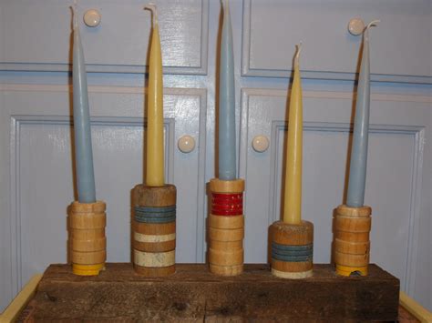 reclaimed crafts: croquet mallet heads repurposed as candlesticks