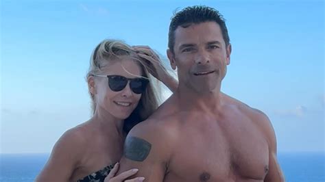 Kelly Ripa, 53, stuns in strapless swimsuit with shirtless Mark ...