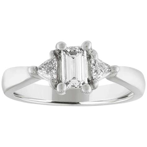 Three Stone Emerald Cut Diamond Ring at 1stDibs