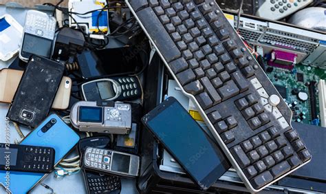 Close up on pile of mixed electronic waste, old broken computer parts ...