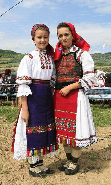 Romanian folk costumes from Libotin (left) and Ungureni (right), both ...