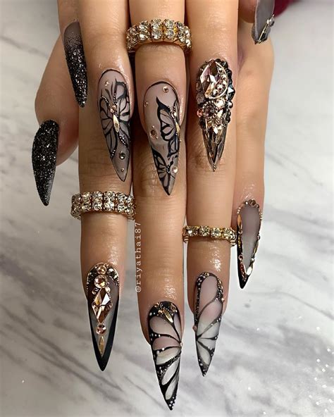 Riya's Nails 🇰🇭 on Instagram: "Black butterfly 🦋 🖤 #RiyaNailsalon # ...