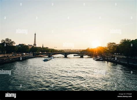 The famous Eiffel Tower and the “Pont des Invalides” bridge in Paris ...