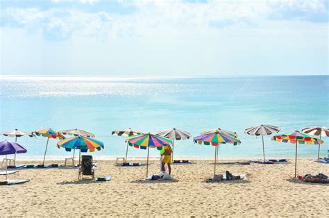 Premium Photo | Tourists are enjoying their activities on the beach in ...